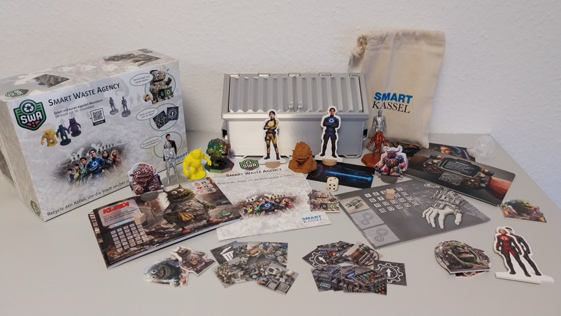 Ein Spiel mit Spielfiguren und verschiedenen Unterlagen
